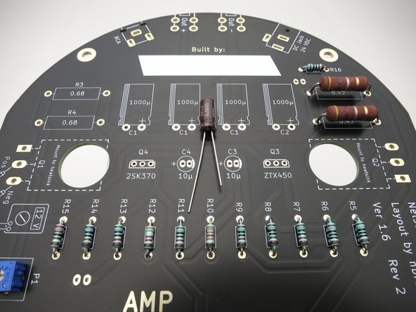 The 10uF caps can be installed and soldered at this time. Remember, long leg in the + hole.