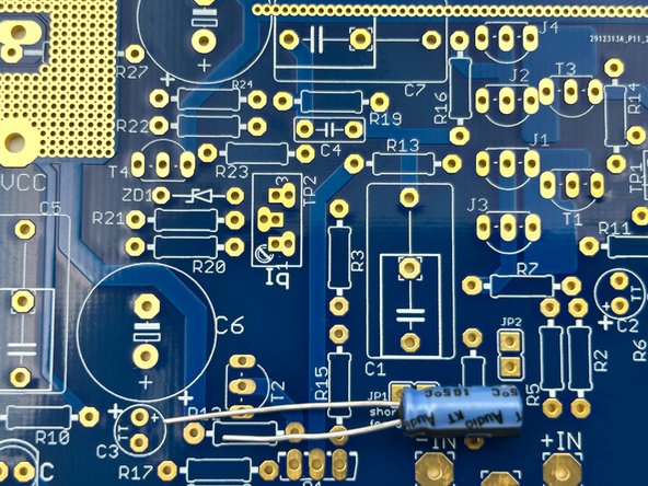 Verify the orientation of the electrolytic capacitors!  The negative side a.k.a. the cathode is indicated with a band.  The cathode lead is the shorter of the two leads.  The positive side a.k.a. the anode is the longer of the two leads.