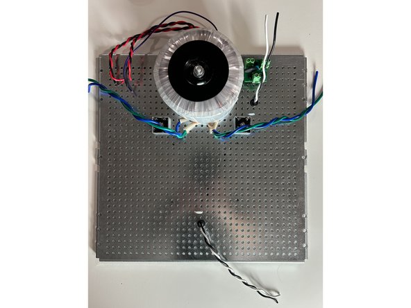 It is convention in the USA to use black for the AC Line / Hot / Live wiring and white for the AC Neutral wiring.  This example uses 16AWG stranded wire rated for 600V.