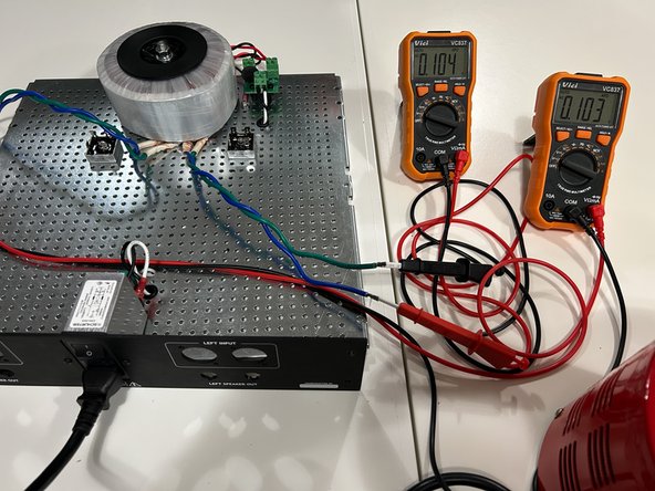Prepare - place yourself in a position to quickly turn the power to the circuit on and off.  Ensure you can see both DMMs.  Immediately power off the circuit if you smell smoke, see sparks, if the DBT bulb glows brightly, or if there is any indication that things are not working properly.