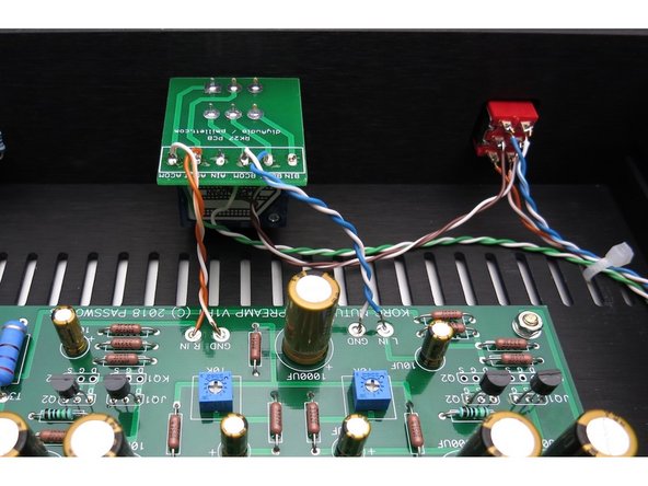 Attach wires from potentiometer to Korg PCB Blue and white/blue for Left.      Orange and white/orange for Right.