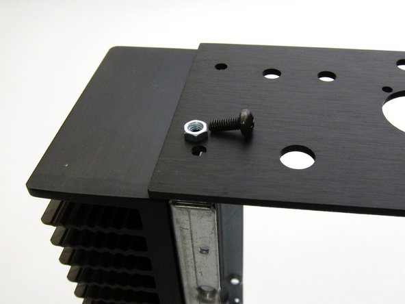 Rear panel attaches with nut and screw