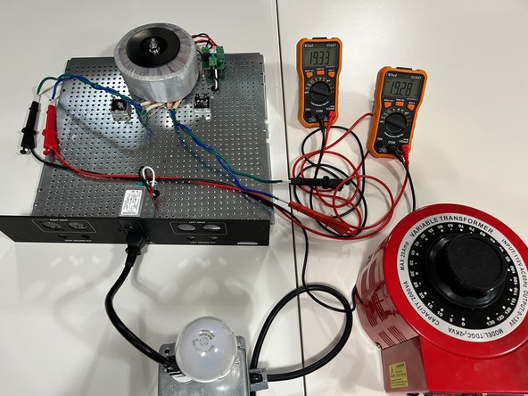 Ensure (as applicable) the variable transformer is set to the lowest output. Power the circuit.  If you're using a variable transformer, you'll see roughly the same voltage as when you connected the DMMs.  If you're not using a variable transformer, you should see roughly 19VAC.