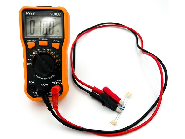 Photo 1 - Remove one set parts from the parts bag.  In this case a pair of resistors.