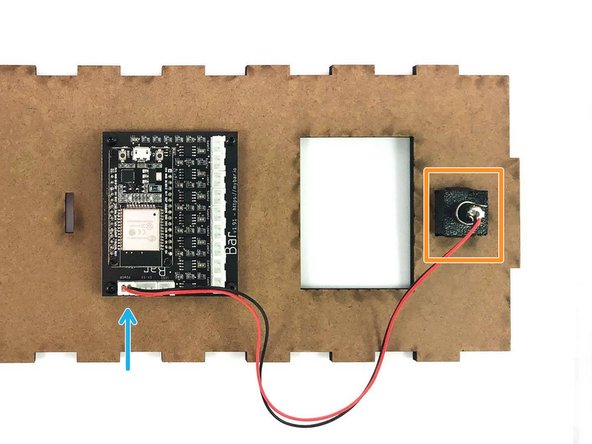 Insert the power jack (with the washer) from the back of the holder and secure it with the nut.