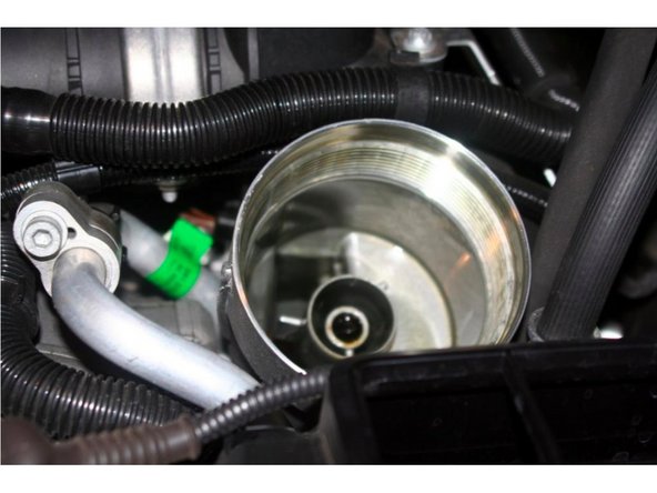 Clean Filter Housing Cap and discard O-Ring