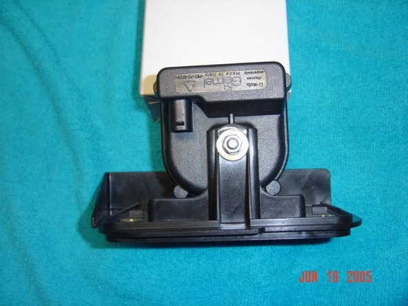 Remove the &quot;plug&quot; from the connector in the wheel well, and plug the connector into the siren. There is a plastic grommet that pushes into the bracket to support the weight of the siren when it is not mounted. Make sure you push this into the bracket before letting the siren &quot;hang&quot;.