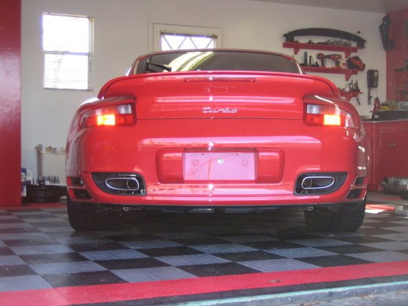 Then remove clamps and engage them on the exhaust brackets without the exhaust.