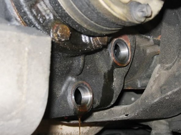 Unbolt drain plug and let it drain for 30 ~ 45 minutes.