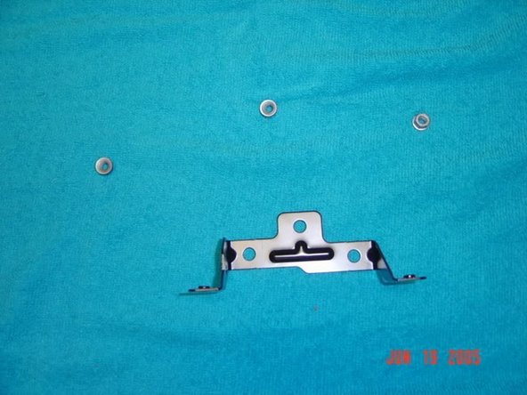 Next, connect the siren to the siren mount with the supplied nut.