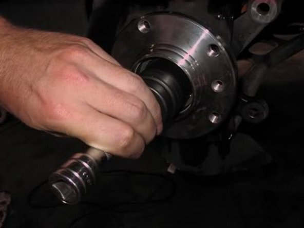 Grab your new front wheel bearing and using a 32 or 36mm socket gently press/tap on the new wheel bearing - I used a 36mm socket and gently tapped it on with a deadblow. You might get lucky and be able to slide on the new bearing by hand.