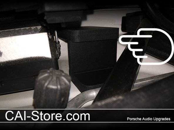 Remove the protective film from the double sided acrylic tape on the bottom side of the mount and stick down in place.