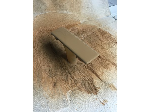 Lay down even coats of paint on the trim piece.