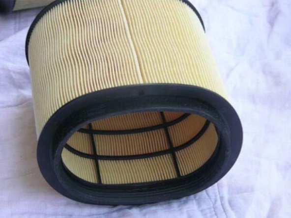 Place new filter onto mount. Some wiggling may be required, as filter is a tight fit with the bottom housing.