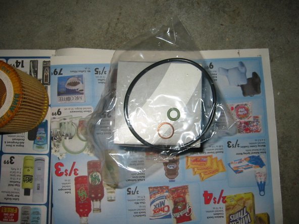 Inside the filter box, there should be two rubber O-rings (small and large) and one copper crush washer