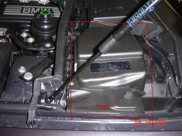 It is taped to another batch of wires neatly. You will see a cap with 3 blue dots on the end, which is a termination for the harness that will eventually plug into the alarm hood switch.