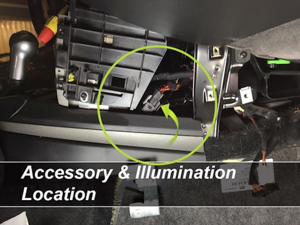 Behind the center console structure (not inside the radio cavity). This location Is the Recommended Connection Point
