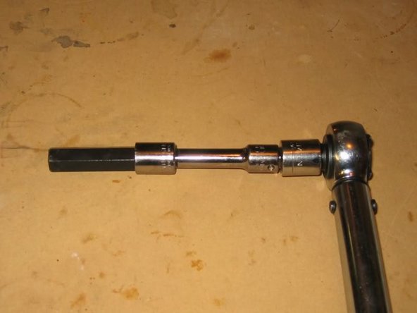 Put fill bolt on with washer and tighten it to 48 ft-lb. I had hard time fitting torque wrench for fill bolt, so I had to use  combination of some adjustments shown below.