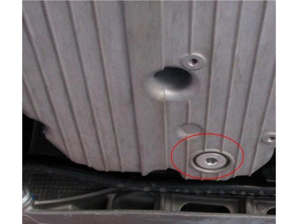 Using 8mm Allen Socket , loosen the drain plug.