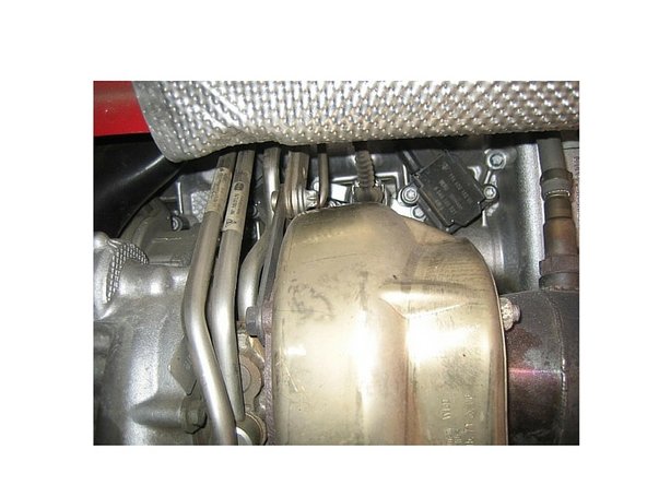 The driver's side is no less difficult. The rear plug is relatively easy. The middle one requires the removal of the cooling lines to the turbo and the VTG unit.