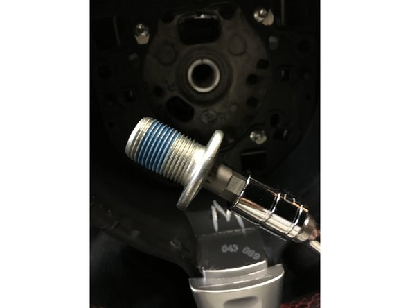 Apply blue thread locking compound