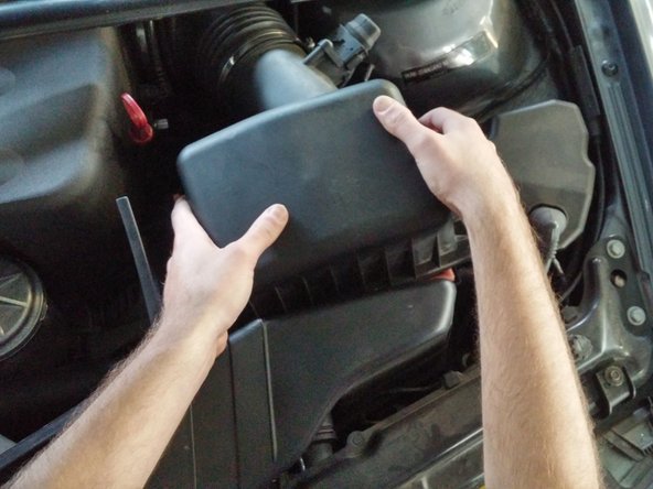 To remove these, press the left side of the lid down and pull up slightly on the right side. While doing this, gently slide the lid to the right.