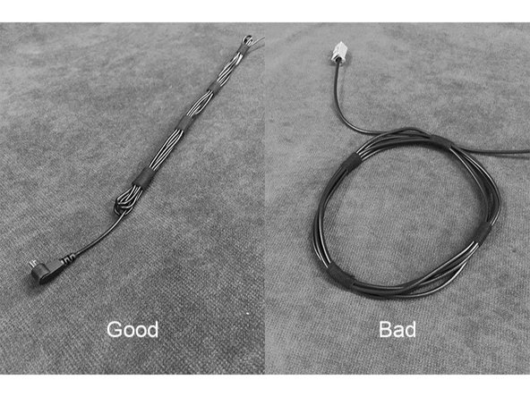 Route cables to the drivers side of the car behind the battery. Zip tie the cables as you go. Be sure not to tie to any moving parts of the windshield wiper system. Remove the single 13 mm battery hold down bolt on the passenger side of the battery. Remove the negative battery terminal.
