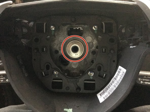 Using a 12 Point Socket 12MM size.... remove the bolt.