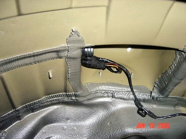 Apparently there is a special tool that fits into the plastic jacking points under the vehicle. They look like upside-down boxes.