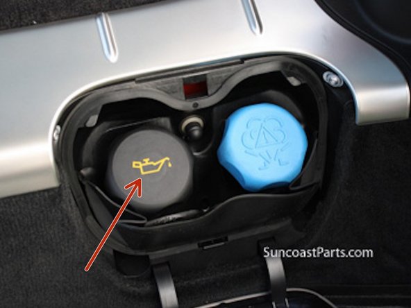 Open Oil Filler in Trunk compartment to allow oil to drain faster.