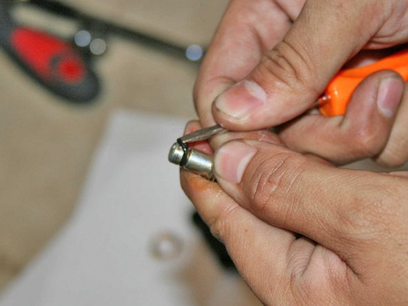 Change the small rubber O-ring at the tip of the oil filter housing bolt.