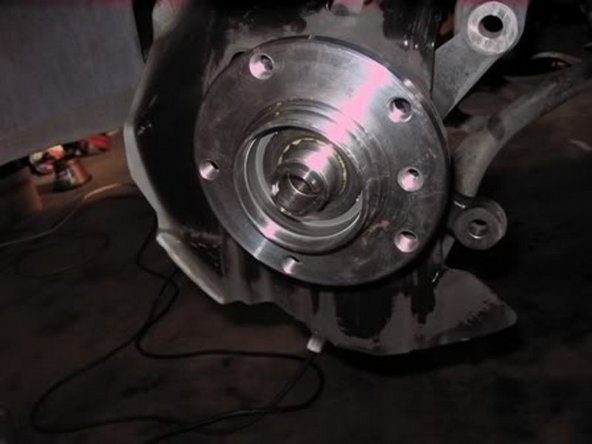 Be careful not to separate the front and rear inner races while installing as you might introduce grit into the new bearing and that might cause an early demise.