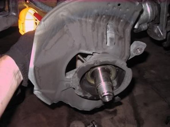 All thats left is the spindle, rear seal cover and brake disc cover so use a punch or something thin to press/gently tap out the inner seal cover to clean it and also the surrounds of the spindle assembly (not required but we all want to do this right).