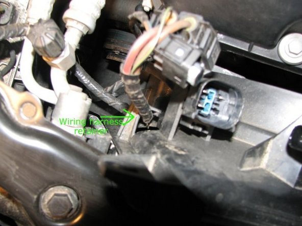 Once you have the electrical connectors off you will need to remove the wires from the retainer holding it to the shroud. I found this to be the hardest part of the DIY :-).