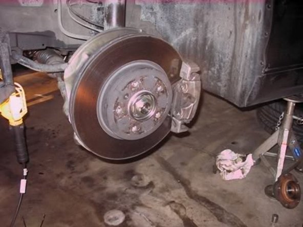 Reinstall the brake disc and torque the retaining bolt to 12 lb ft or per Bentley for your model and then reinstall caliper and torque the caliper to the spindle per Bentley (81 lb ft for my 01 325).