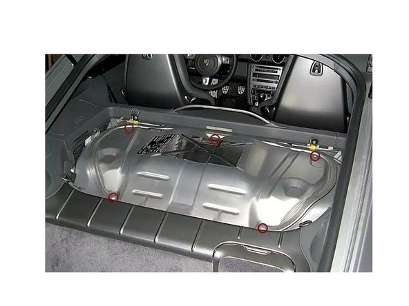 The metallic engine cover is now fully visible. There are 5 screws to remove with the 4 mm Torx driver (red circles).