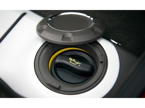 Open Oil Filler in Trunk compartment to allow oil to drain faster.