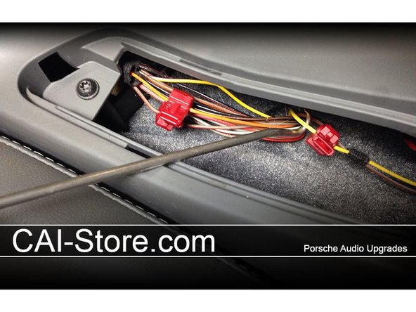 Under this panel you will find a wire harness that has three of the circuits that you will need to tap into. A hook tool comes in very handy to pull the wires up to a point where the can be accessed (don't force them).