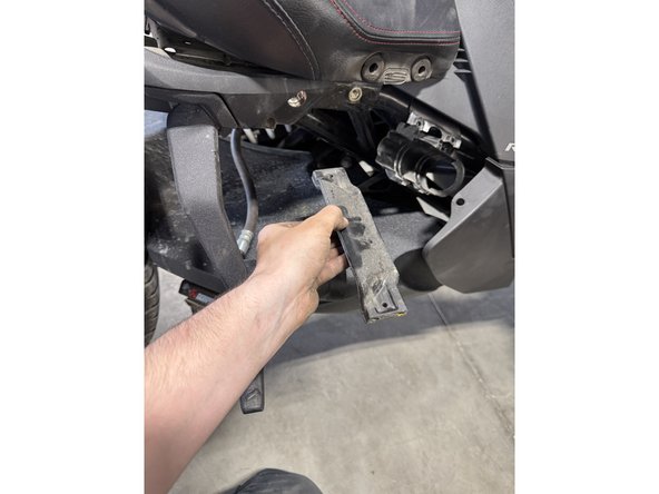 Remove the 4 bolts holding the support and remove the support.