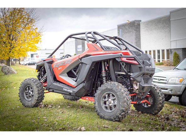 Install new rear Elka shocks with the reservoir facing rear of vehicle.