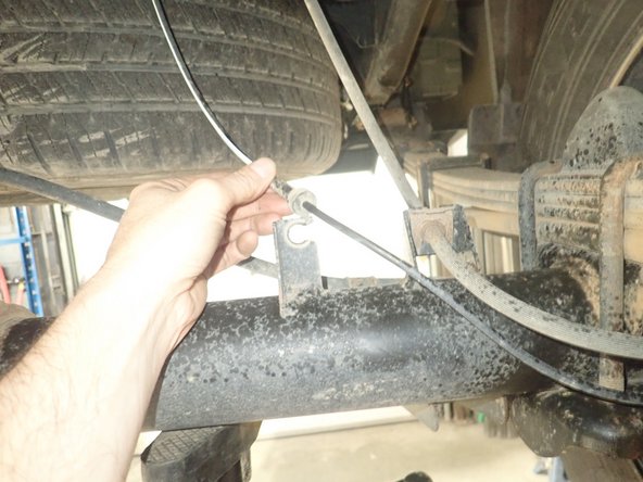 Unhook brake lines to make sure you don't damage them during installation.