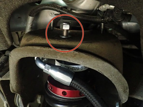 Start installation with the provided lower bolts and washers. Apply threads locker on bolts, then torque them at 60 ft.lb.