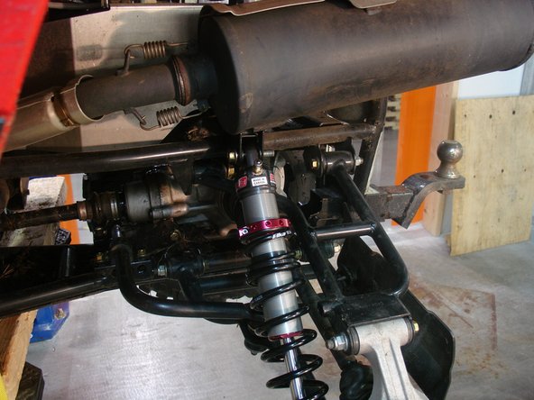 For Stage 1 and Stage 2 shocks, install them with the shraedder valve facing the outside of vehicle.