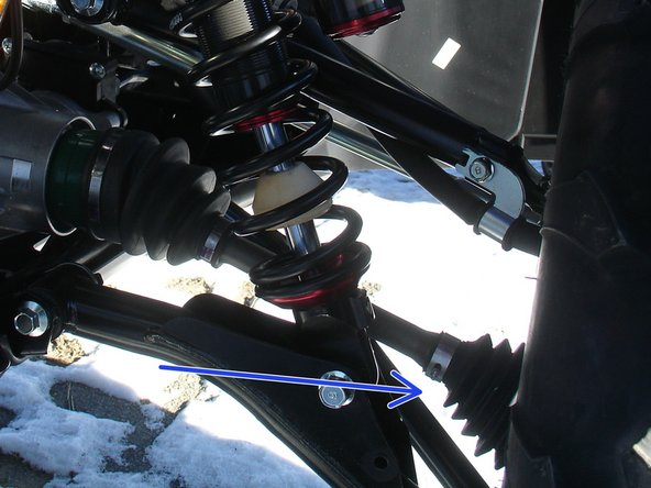 On Stage 2, Stage 4 and Stage 5 models, the lower shock eyelets should be installed with the rebound adjuster oriented towards the outside of the vehicle as shown by the blue Arrow on the photo ( left side shown ). If needed, you can turn the lower eyelet to orient properly.