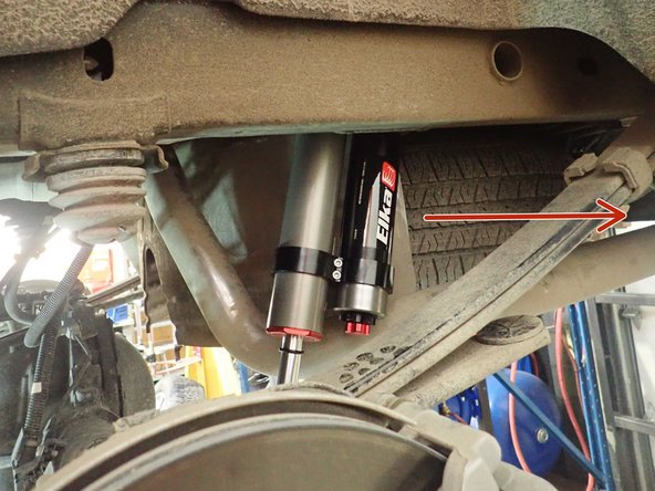 Remove upper and lower bolts from OEM shocks. Keep OEM bolts to install Elka shocks.
