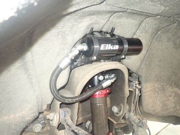 To complete front installation, put back sway-bar links and wheels.