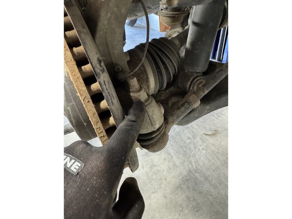 Remove the nuts from the tie rod.