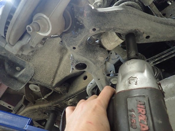 Remove lower shock bolts.