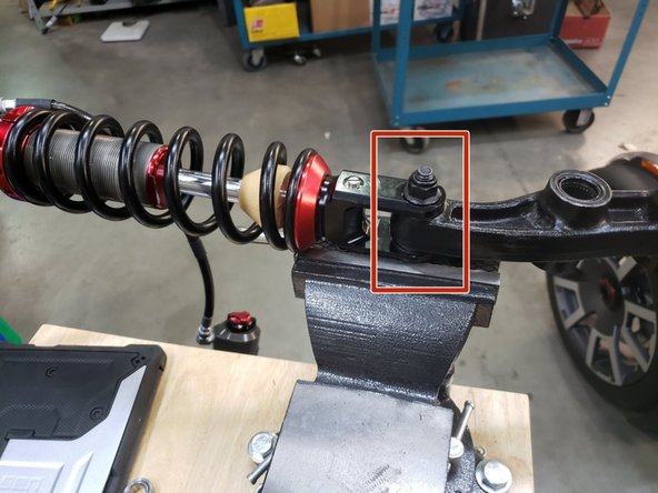 Install Elka Shock into bracket (refer to photo for orientation)