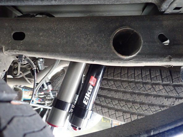 ON DENALI MODELS (With Magneride system): Before removing shocks, you have to disconnect electric connectors  situated on top of shocks. Don't forget to install bypass modules like front shocks.